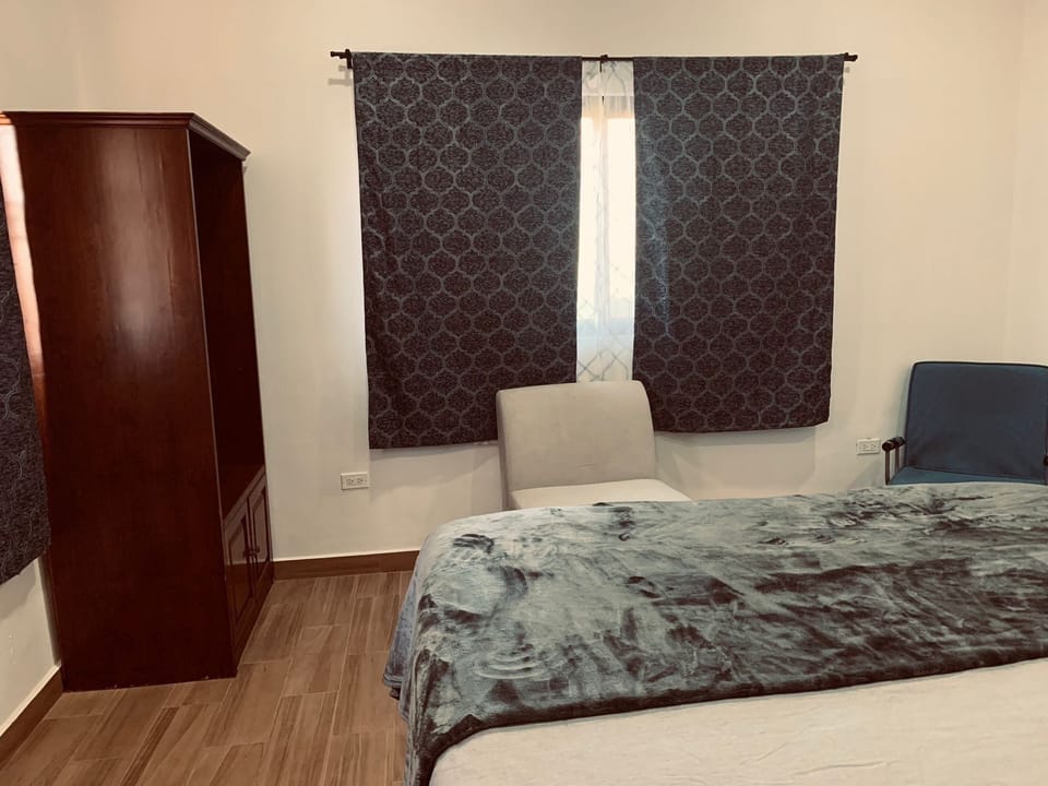 Indulge in ultimate relaxation with our spacious bedroom