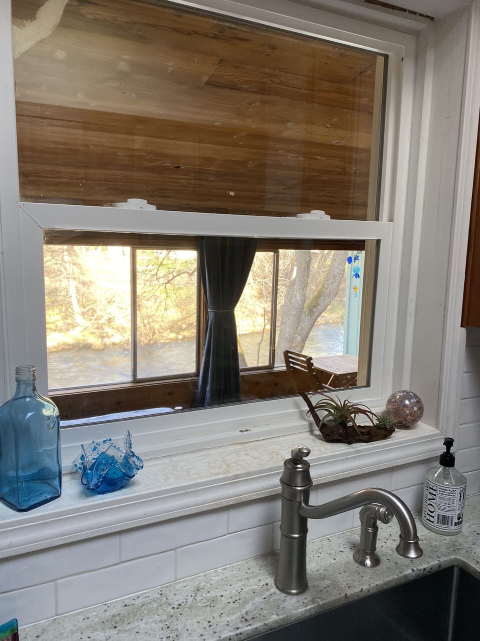 view of creek from the kitchen