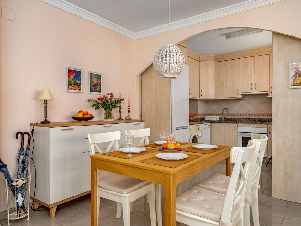 Furniture, Tableware, Table, Bottle, Building, Wood, Drinkware, Window, Chair, Flooring