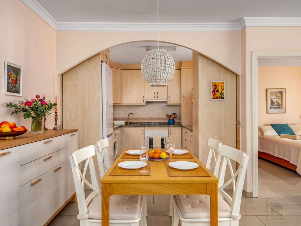 Furniture, Tableware, Table, Bottle, Building, Wood, Drinkware, Window, Chair, Flooring