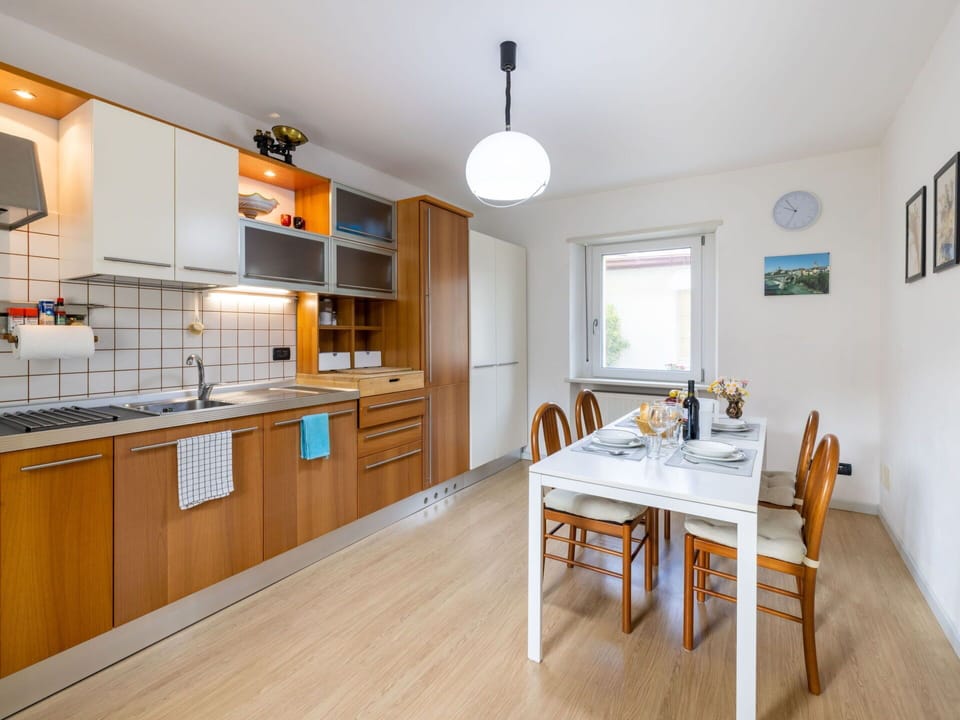 Cabinetry, Furniture, Countertop, Wood, Lighting, Table, Kitchen Appliance, Chair, Kitchen, Sink