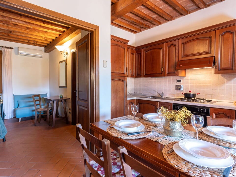 Property, Table, Furniture, Cabinetry, Wood, Chair, Countertop, Interior Design, Flooring, Dishware
