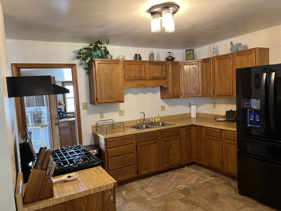 Kitchen with gas range. 