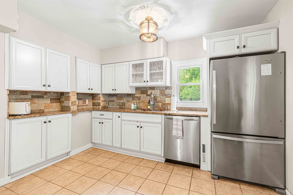 Spacious, fully stocked kitchen.