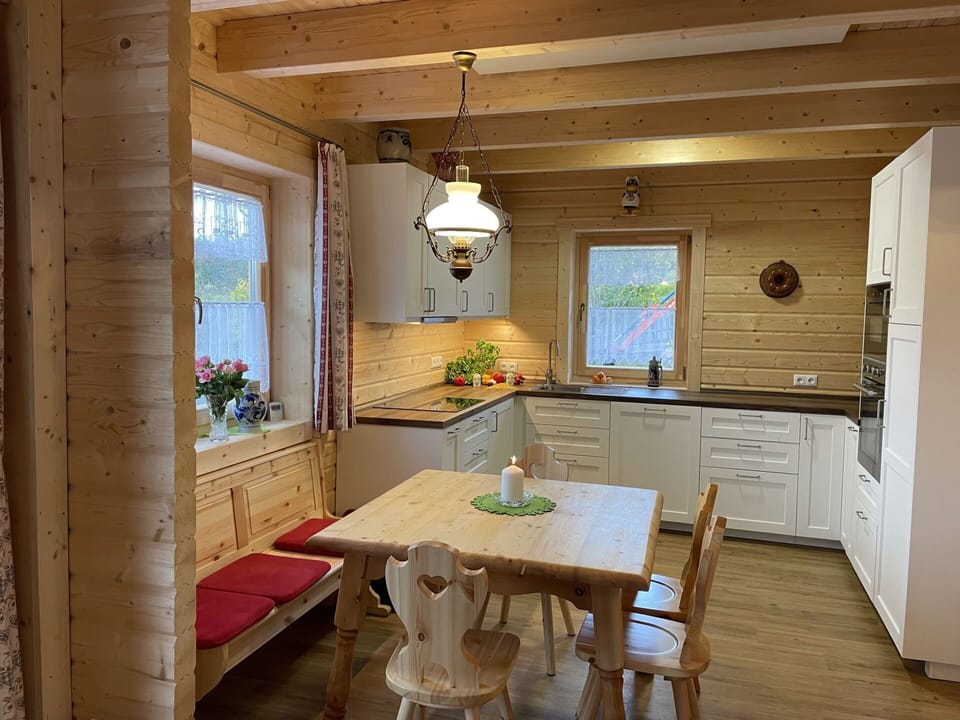 Property, Furniture, Table, Cabinetry, Chair, Wood, Interior Design, Countertop, Plant, Kitchen