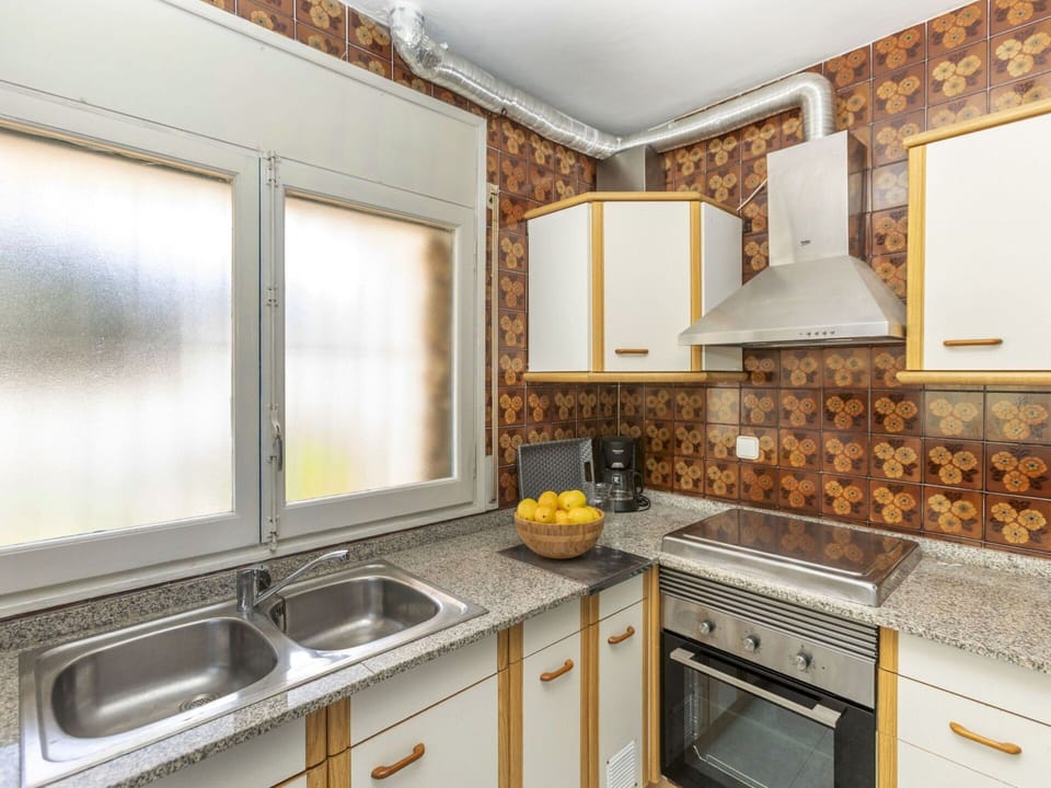 Wood, Interior Design, Kitchen, Countertop, Flooring, Major Appliance, Plumbing Fixture, Floor, Sink, Ceiling