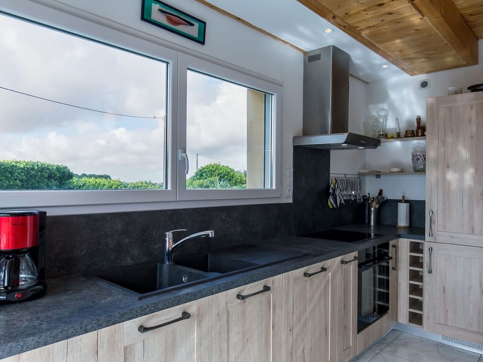 Cabinetry, Kitchen Sink, Countertop, Property, Tap, Sink, Window, Sky, Plumbing Fixture, Building