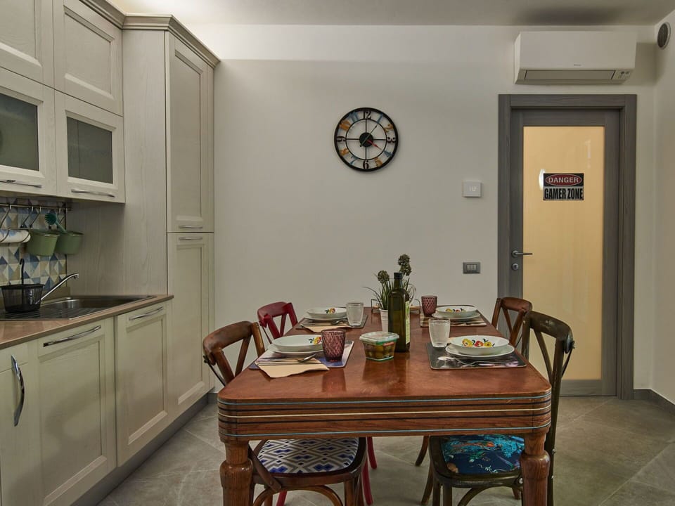 Furniture, Property, Table, Cabinetry, Countertop, Building, Chair, Wood, Interior Design, Lighting