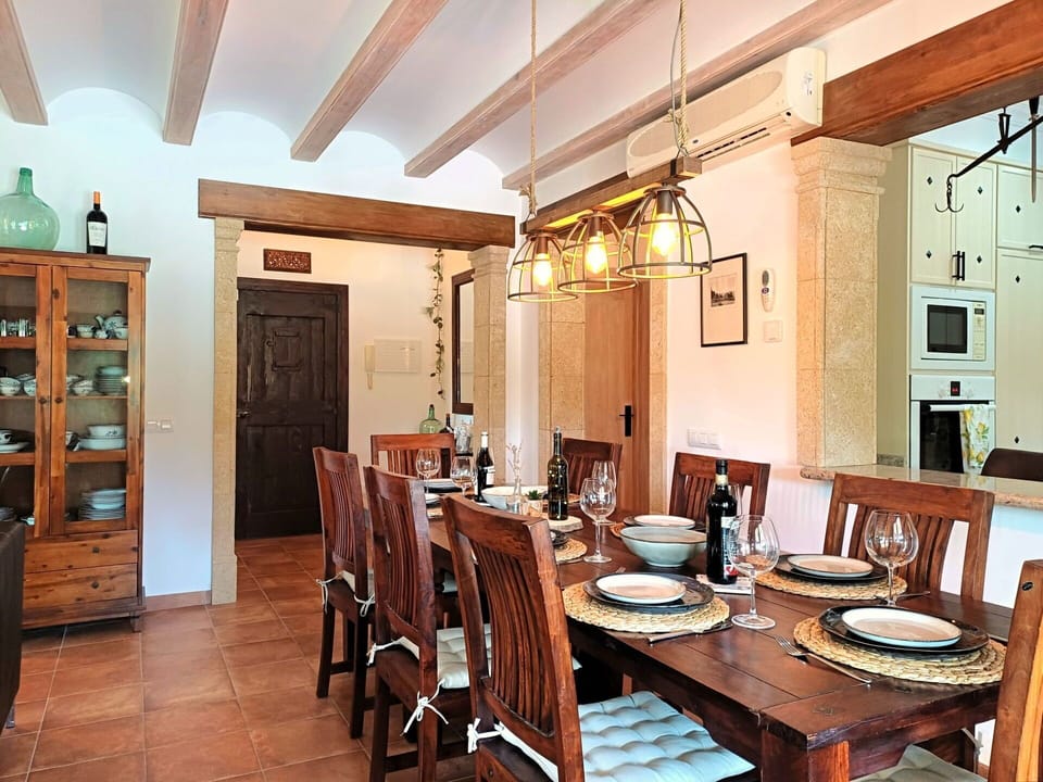 Furniture, Interior Design, Dining Room, Wood, Flooring, Ceiling, Chair, Table, Light Fixture, Kitchen & Dining Room Table