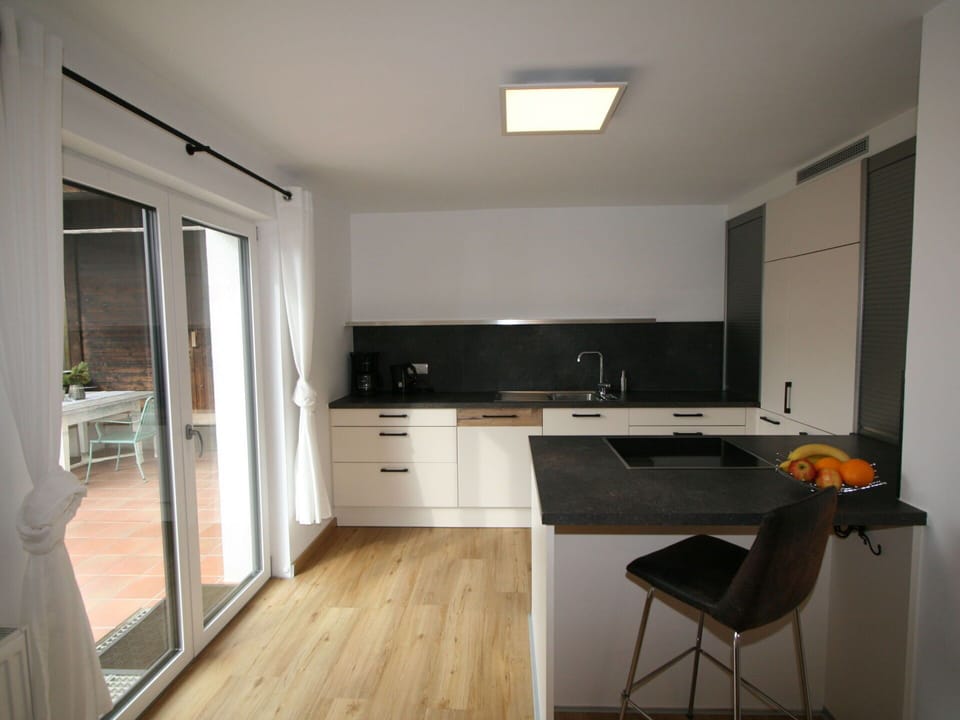 Cabinetry, Countertop, Property, Furniture, Wood, Kitchen, Flooring, Building, Interior Design, Floor