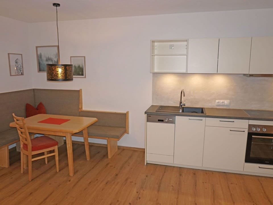 Furniture, Cabinetry, Property, Countertop, Sink, Table, Picture Frame, Wood, Kitchen Stove, Interior Design