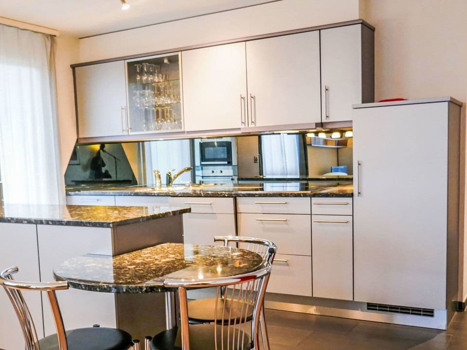 Kitchen, Furniture, Interior Design, Flooring, Kitchen Appliance, Countertop, Cabinetry, Wood, Major Appliance, Floor