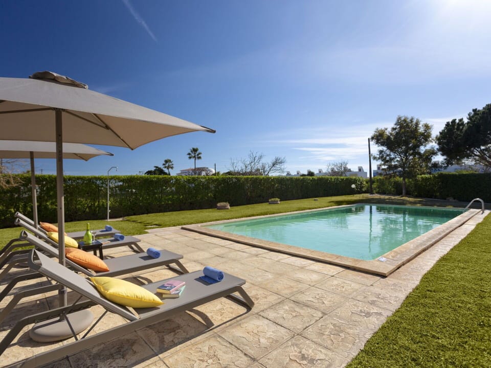 Water, Plant, Cloud, Building, Sky, Property, Swimming Pool, Azure, Shade, Rectangle