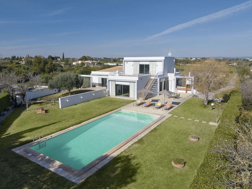 Water, Plant, Cloud, Building, Sky, Property, Swimming Pool, Azure, Shade, Rectangle