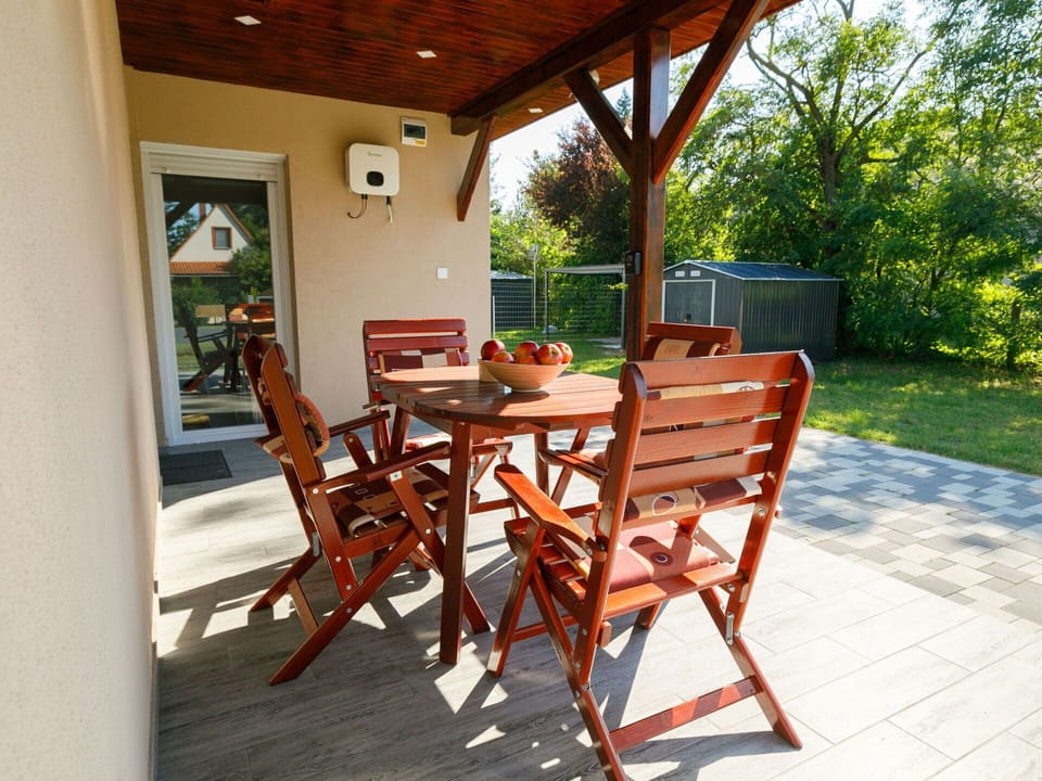Furniture, Plant, Table, Chair, Building, Wood, Outdoor Furniture, Porch, Outdoor Table, Tree