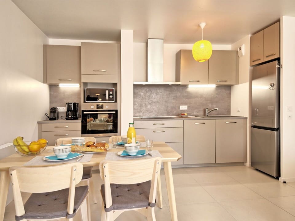 Cabinetry, Furniture, Countertop, Property, Kitchen, Kitchen Appliance, Kitchen Stove, Home Appliance, Interior Design, Lighting