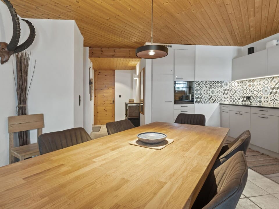 Furniture, Property, Cabinetry, Table, Countertop, Chair, Wood, Interior Design, Lighting, Floor