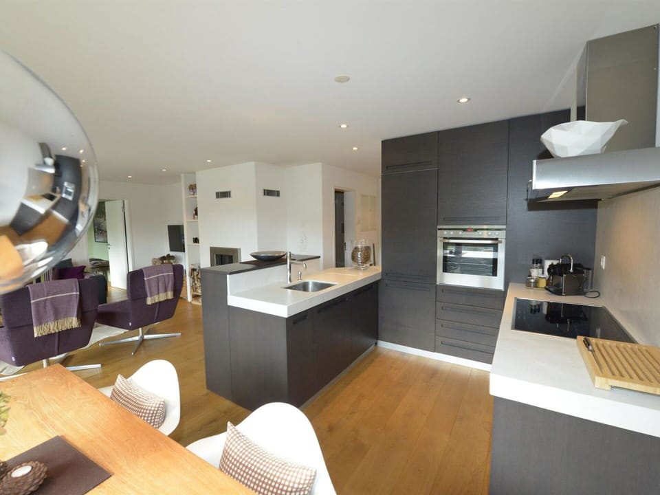 Furniture, Property, Countertop, Table, Cabinetry, Lighting, Interior Design, Wood, Kitchen, Flooring
