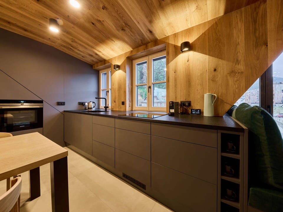 Cabinetry, Countertop, Property, Furniture, Kitchen, Wood, Lighting, Interior Design, Architecture, Flooring