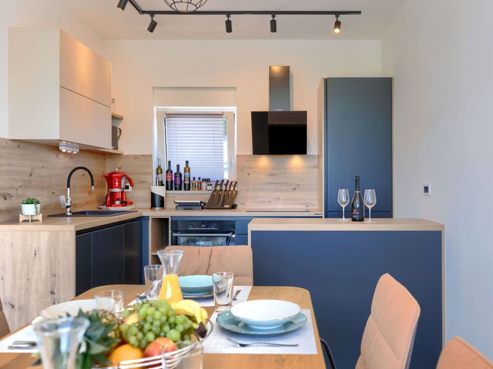 Property, Table, Tableware, Furniture, Cabinetry, Countertop, Dishware, Kitchen, Interior Design, Food