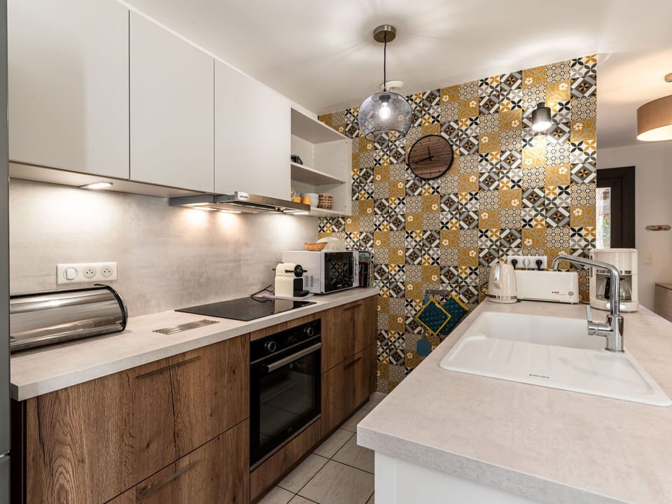 Cabinetry, Furniture, Countertop, Tap, Plumbing Fixture, Building, Kitchen Stove, Wood, Lighting, Interior Design