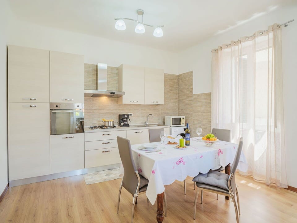 Furniture, Property, Cabinetry, Table, Countertop, Chair, Building, Wood, Lighting, Interior Design