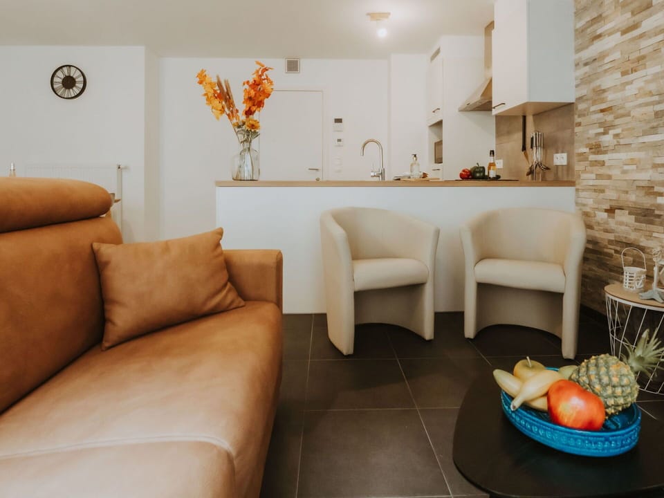 Furniture, Building, Property, Table, Comfort, Orange, Interior Design, Plant, Lighting, Textile