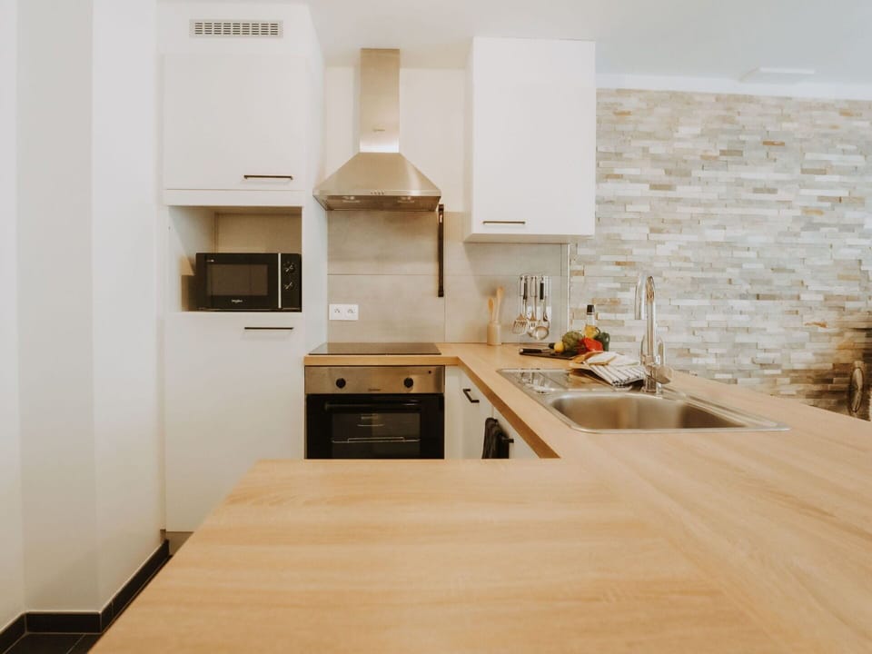 Cabinetry, Countertop, Sink, Tap, Wood, Kitchen, Interior Design, Wood Stain, Flooring, Drawer
