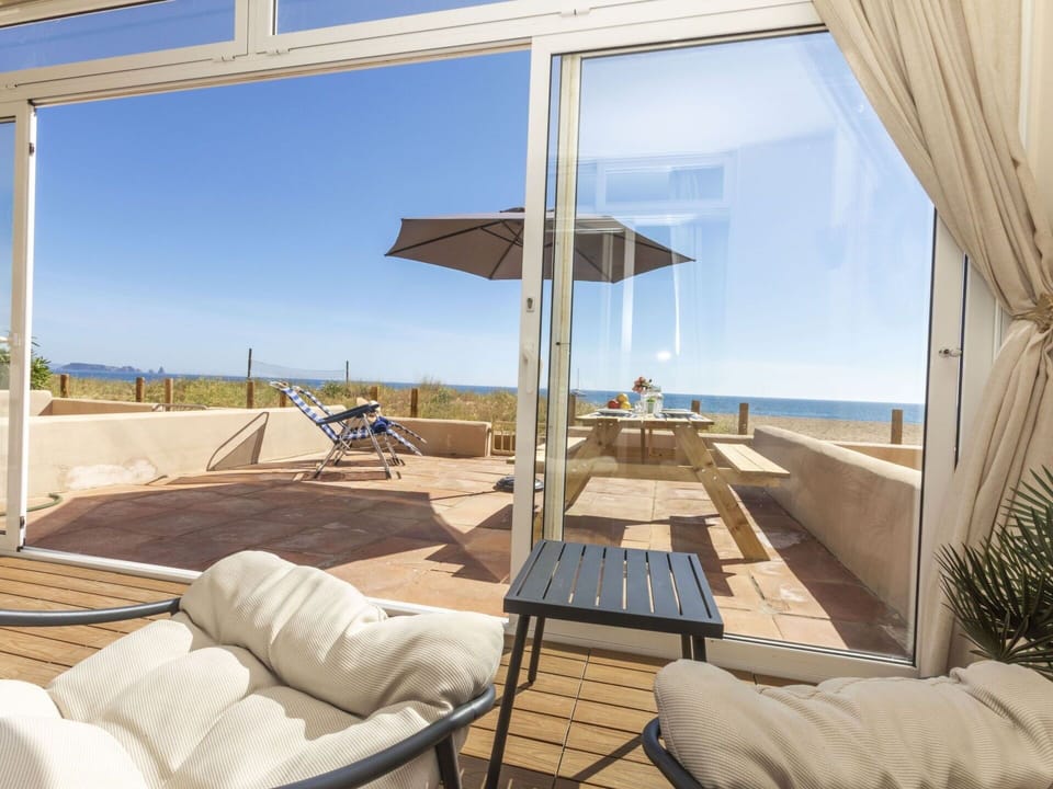 Furniture, Floor, Chair, Shade, Balcony, Hardwood, Outdoor Furniture, Wood Stain, Wood Flooring, Resort
