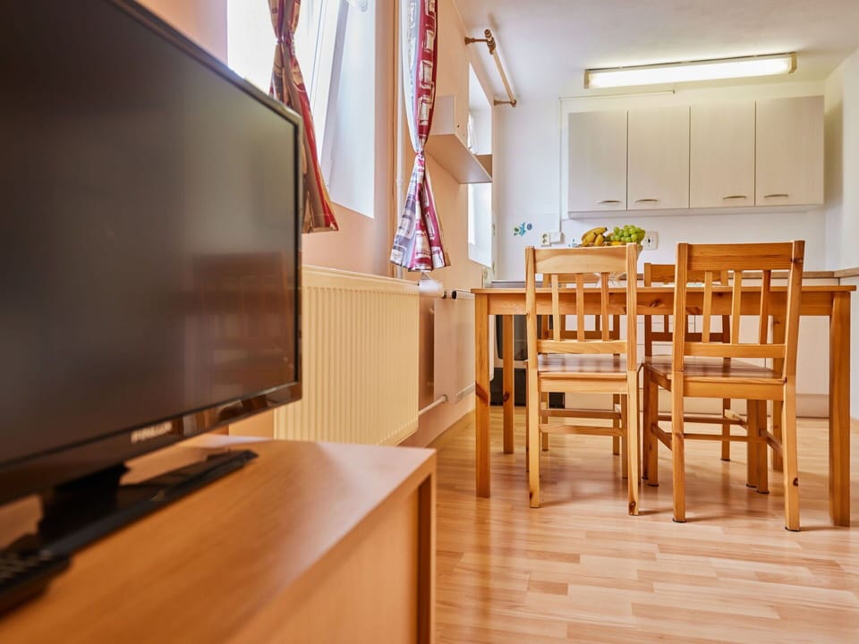 Furniture, Table, Wood, Interior Design, Floor, Chair, Flooring, Wall, Hardwood, Television Set