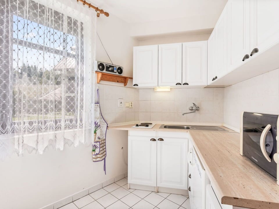 Kitchen, Cabinetry, Interior Design, Countertop, Major Appliance, Furniture, Flooring, Wood, Kitchen Appliance, Floor