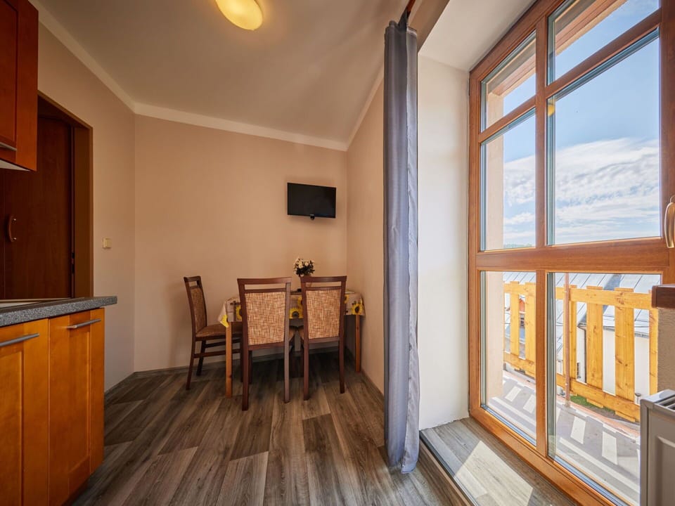 Property, Cabinetry, Wood, Interior Design, Lighting, Architecture, Window, Wood Stain, Floor