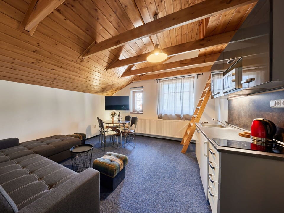 Furniture, Couch, Table, Cabinetry, Wood, Interior Design, Lamp, Flooring, Building, Hardwood