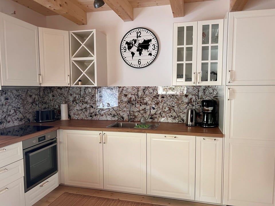 Cabinetry, Property, Countertop, Wood, Interior Design, Architecture, Kitchen, Building, Floor, Flooring