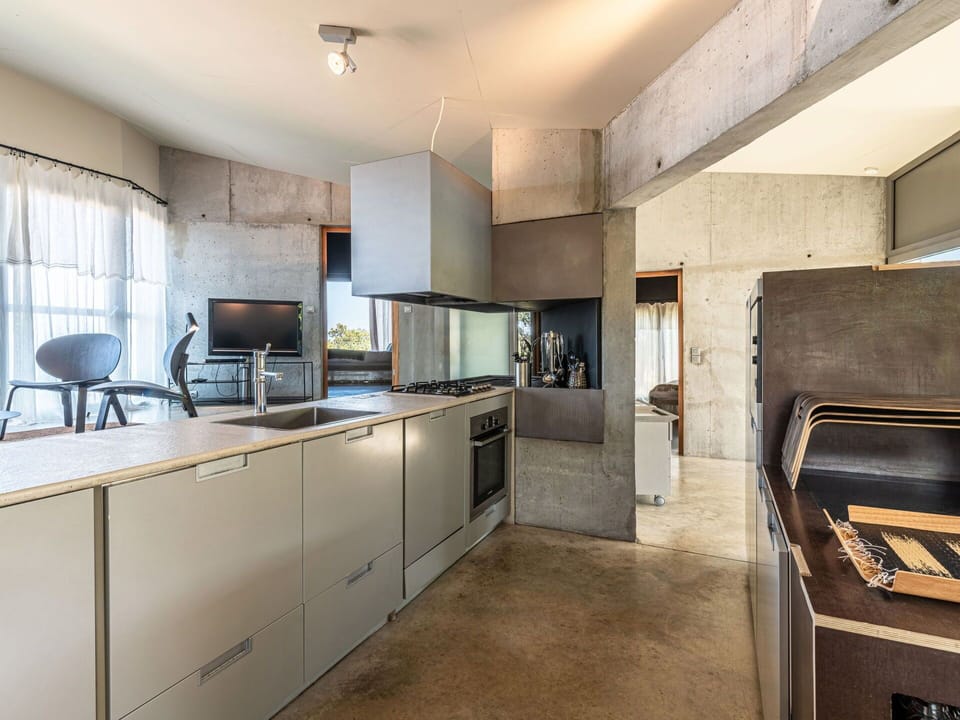 Cabinetry, Furniture, Property, Countertop, Kitchen Stove, Kitchen Appliance, Home Appliance, Chair, Interior Design, Wood