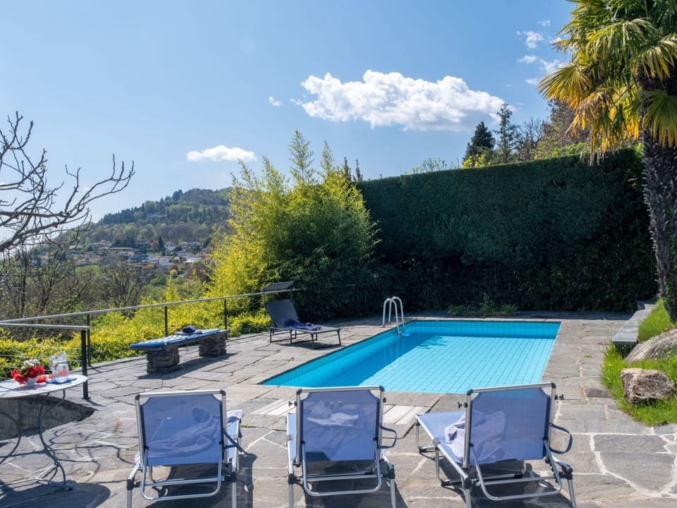 Cloud, Plant, Sky, Property, Table, Swimming Pool, Blue, Building, Azure, Chair