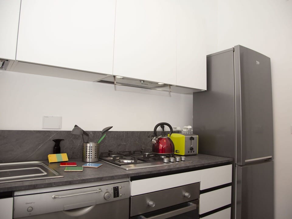 Cabinetry, Tap, Countertop, Building, Interior Design, Kitchen Stove, Kitchen, Kitchen Appliance, Drawer