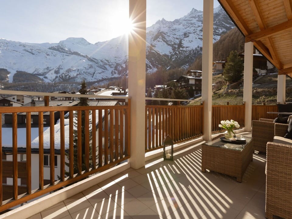 Sky, Property, Building, Mountain, Light, Fence, Flowerpot, Wood, Porch, Snow