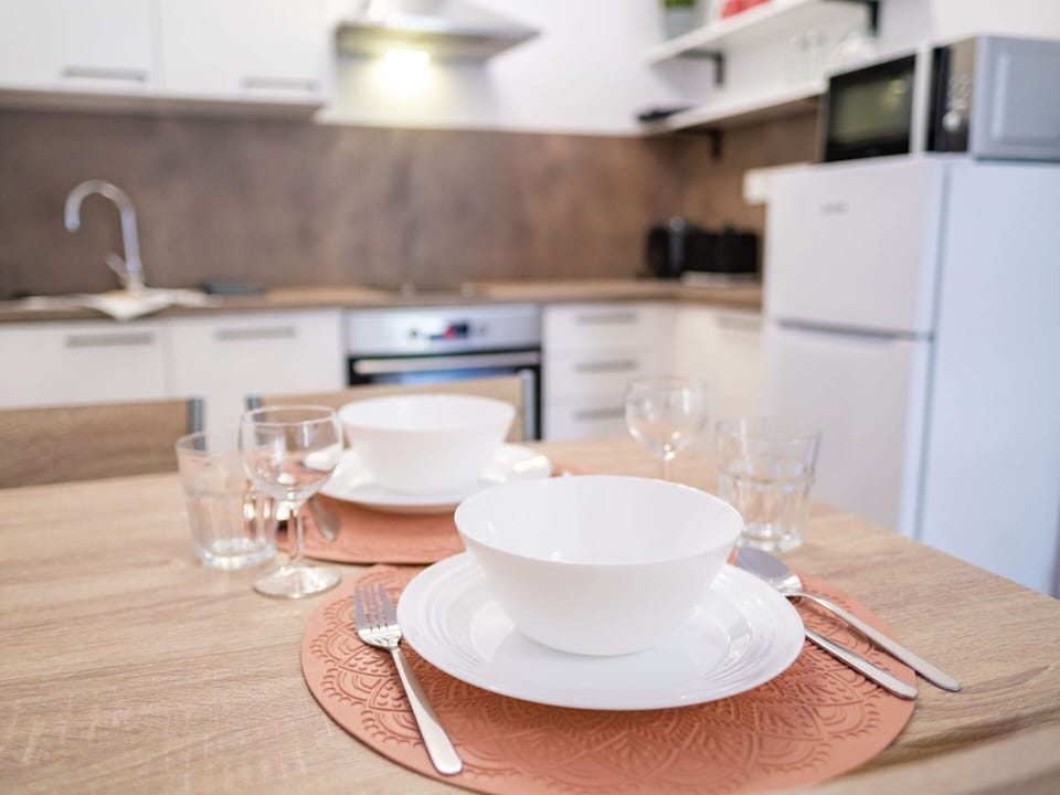 Tableware, Sky, Table, Property, Plant, Furniture, Building, Cloud, Dishware, Cup