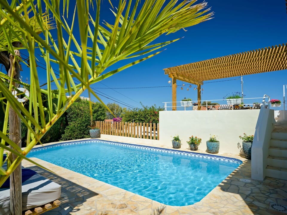 Water, Property, Swimming Pool, Plant, Blue, Azure, Shade, Sky, Architecture, Outdoor Furniture