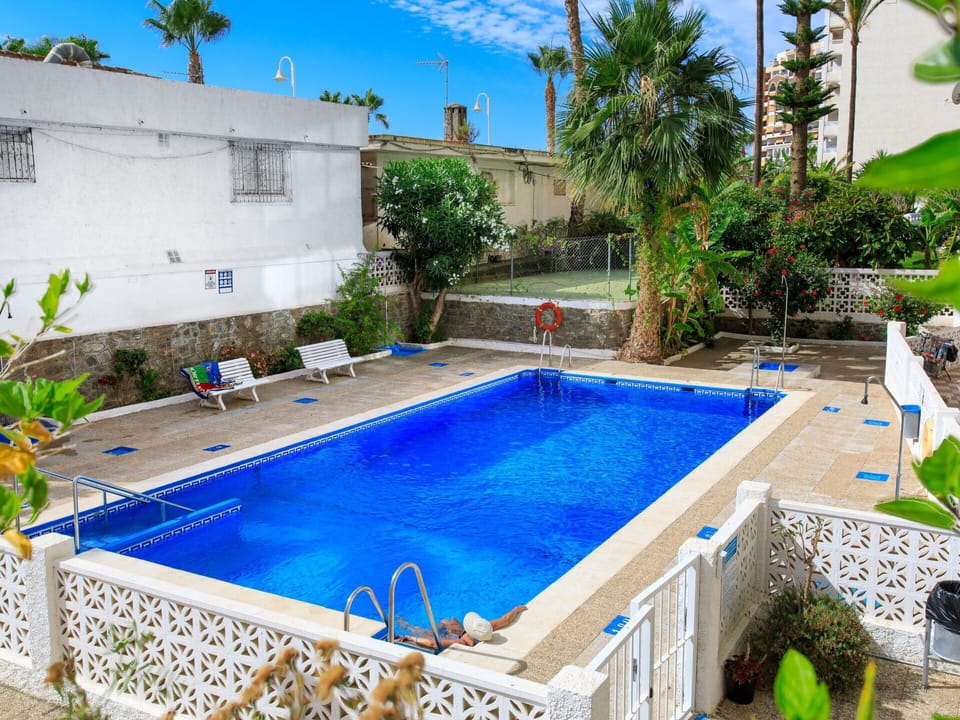Water, Plant, Building, Property, Swimming Pool, Sky, Green, Azure, Tree, Chair