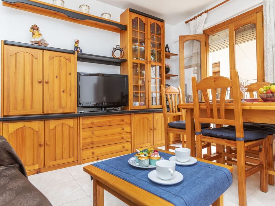 Table, Furniture, Property, Cabinetry, Tableware, Window, Wood, Dishware, Interior Design, Lighting