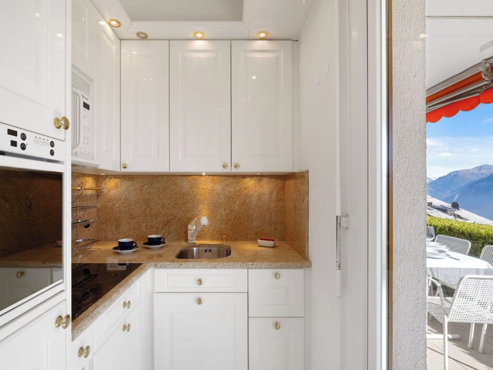 Kitchen, Wood, Interior Design, Major Appliance, Cabinetry, Kitchen Appliance, Flooring, Countertop, Furniture, Floor