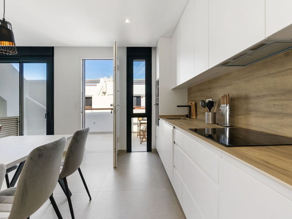 Sky, Building, Table, Window, Outdoor Furniture, Urban Design, Wood, Shade, Condominium, House
