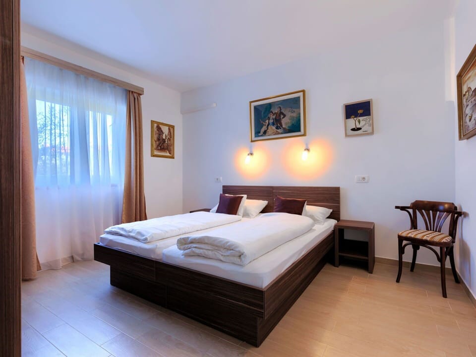 Sky, Building, Table, Window, Outdoor Furniture, Urban Design, Wood, Shade, Condominium, House