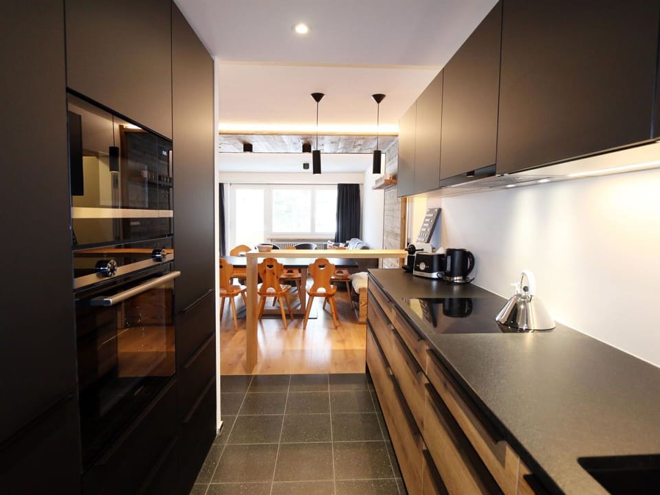 Cabinetry, Countertop, Furniture, Kitchen, Kitchen Appliance, Home Appliance, Wood, Lighting, Interior Design, Kitchen Stove