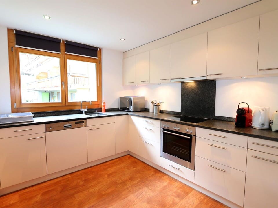 Brown, Countertop, Cabinetry, Window, Kitchen Stove, Home Appliance, Kitchen Appliance, Kitchen, Wood, Tap