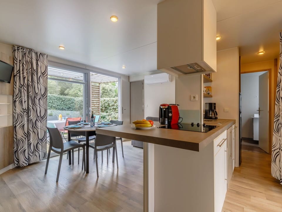 Table, Furniture, Cabinetry, Countertop, Building, Kitchen, Wood, Chair, Home Appliance, Flooring