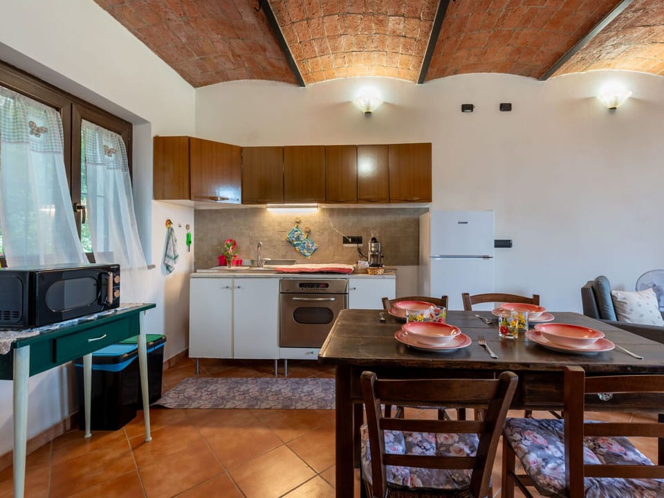 Furniture, Cabinetry, Table, Property, Countertop, Wood, Kitchen, Lighting, Interior Design, Flooring