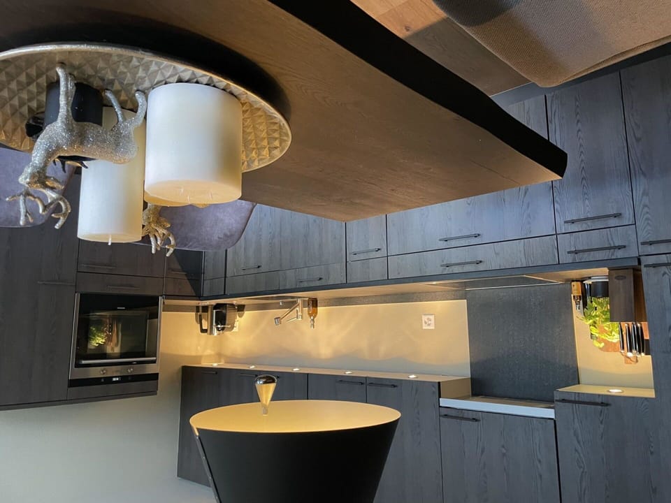 Property, Cabinetry, Countertop, Light, Wood, Interior Design, Kitchen, Flooring, Floor, Building